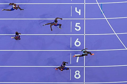 Letsile Tebogo, of Botswana, lane seven, wins the men's 200-meter final